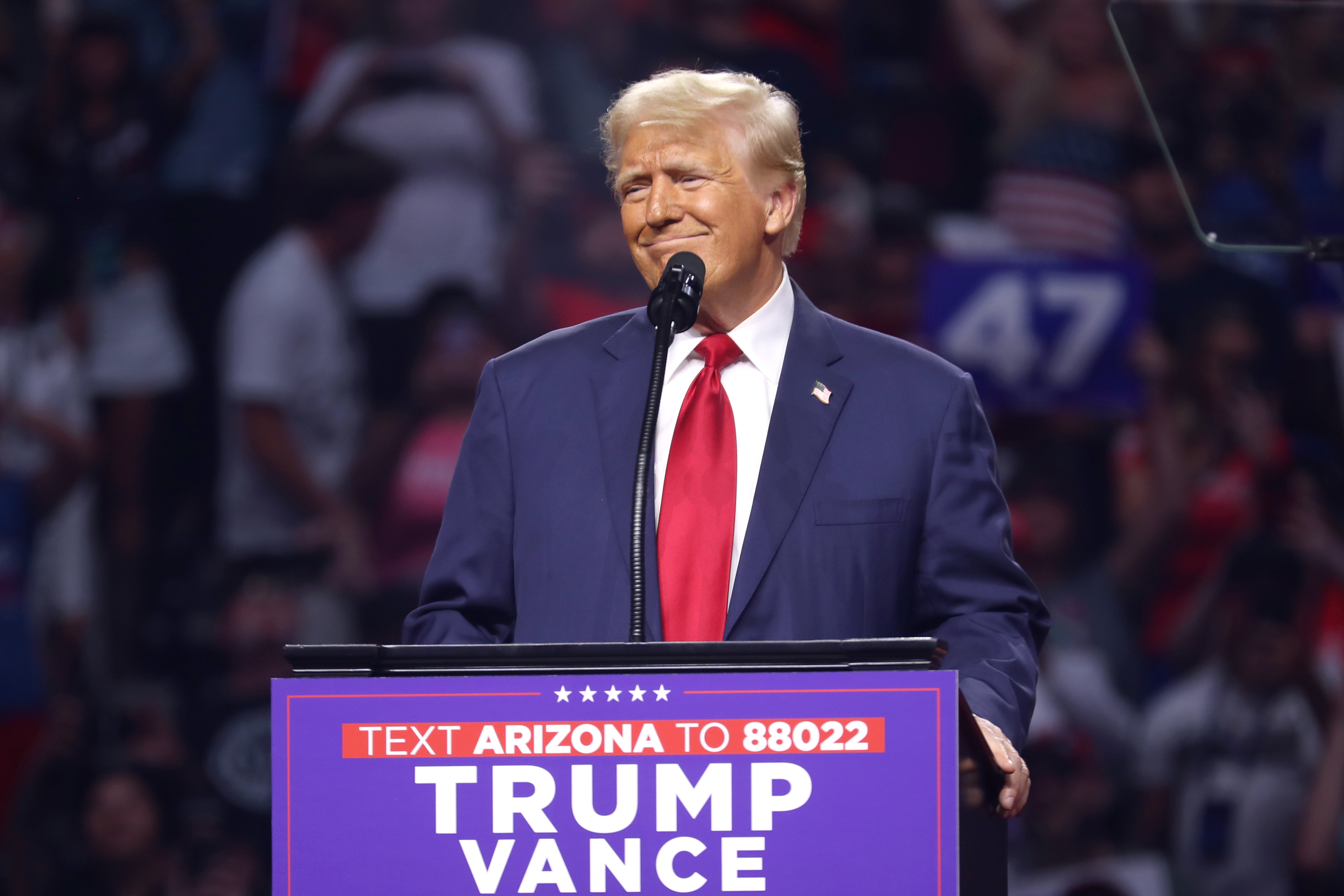 Political rally crowd at night